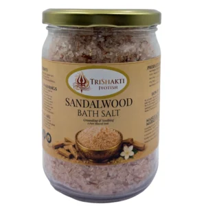 TriShakti Jyotish Sandalwood Bath Salt glass jar on a white background.